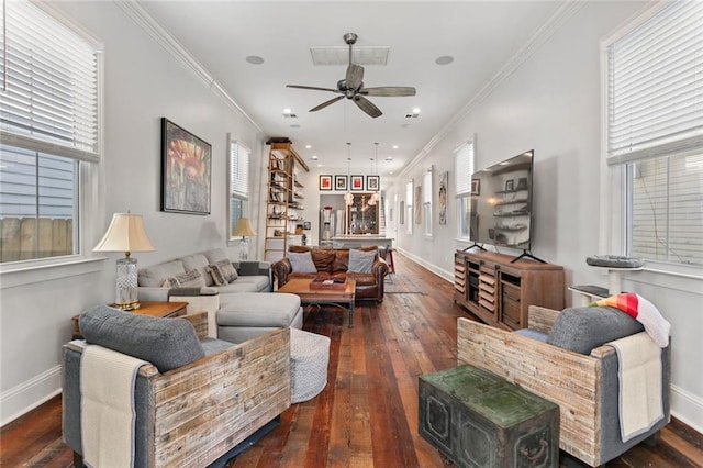 living room with ornamental molding, ceiling fan, and dark hardwood / wood-style floors