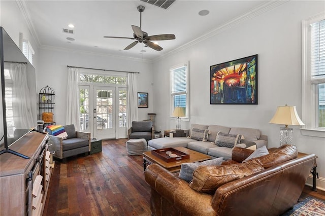 living room featuring ceiling fan, crown molding, dark hardwood / wood-style flooring, and a wealth of natural light