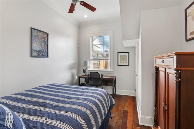 bedroom featuring ornamental molding, ceiling fan, and dark wood-type flooring