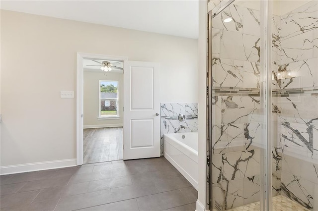 bathroom with ceiling fan, plus walk in shower, and tile patterned floors