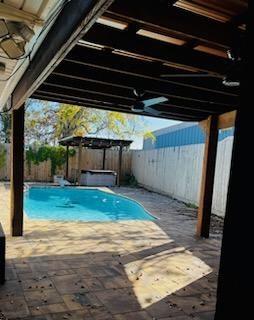 view of swimming pool featuring a patio