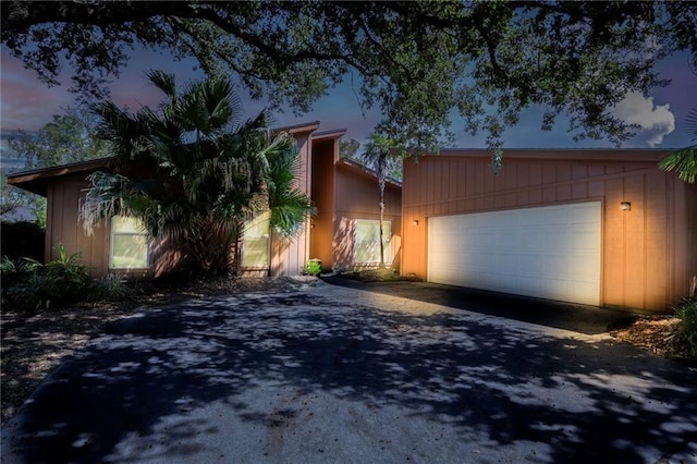 213 Surrey Dr, La Place, LA 70068 - view of front of home with driveway and an attached garage