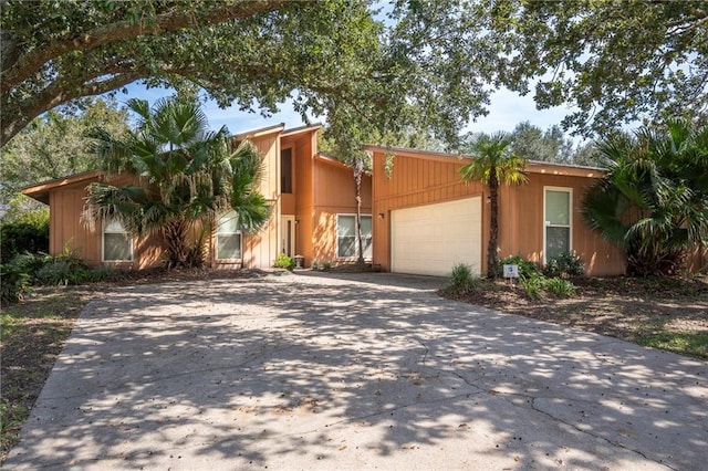 213 Surrey Dr, La Place, LA 70068 - view of front of property with concrete driveway and an attached garage
