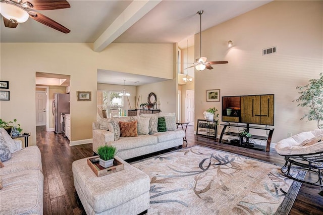 living room featuring ceiling fan with notable chandelier, dark hardwood / wood-style flooring, beamed ceiling, and high vaulted ceiling