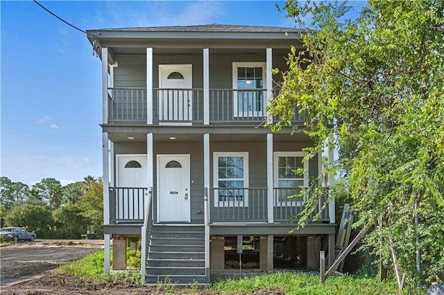 coastal inspired home featuring a porch