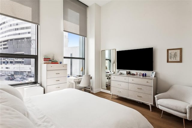 bedroom featuring dark hardwood / wood-style floors