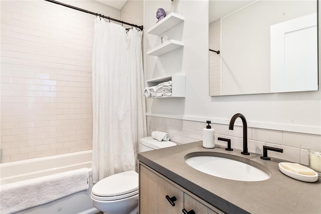 full bathroom featuring tile walls, shower / bath combo with shower curtain, tasteful backsplash, vanity, and toilet