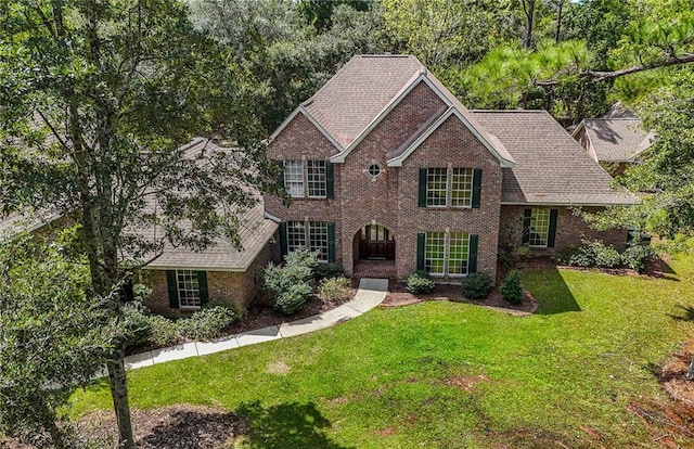 view of front of home with a front yard