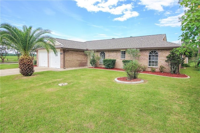 ranch-style house with a garage and a front lawn