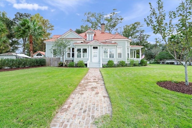 view of front of home with a front lawn