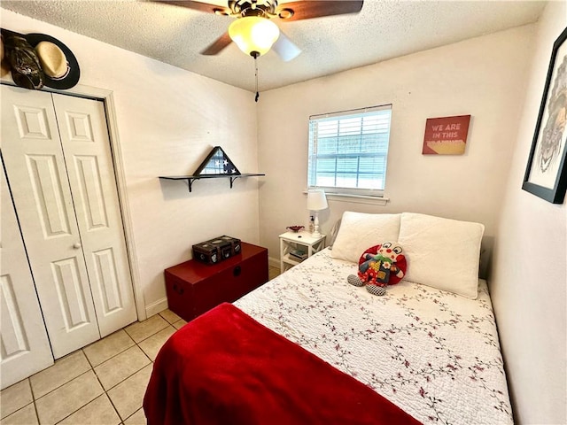 full bathroom with shower / bath combination with curtain, vanity, toilet, and tile patterned floors