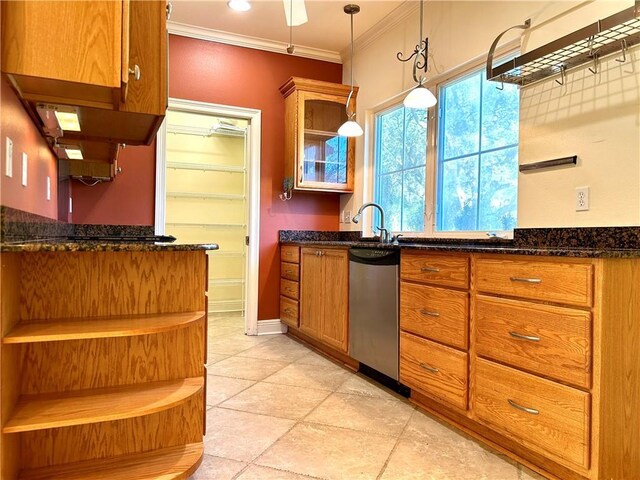 kitchen with ornamental molding, dark stone countertops, stainless steel dishwasher, and hanging light fixtures