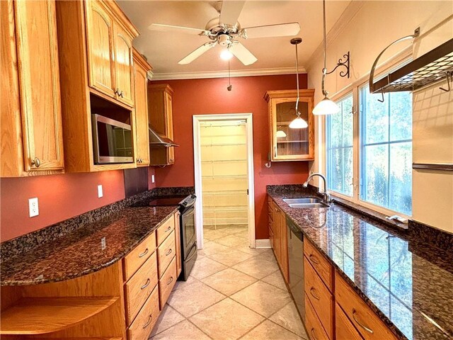 kitchen with extractor fan, ceiling fan, appliances with stainless steel finishes, pendant lighting, and sink