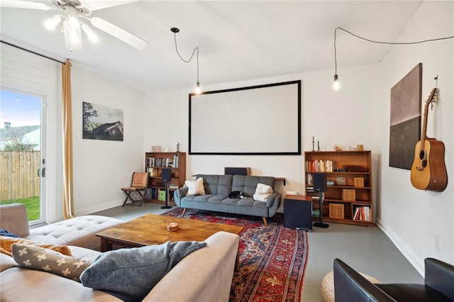 cinema room featuring ceiling fan