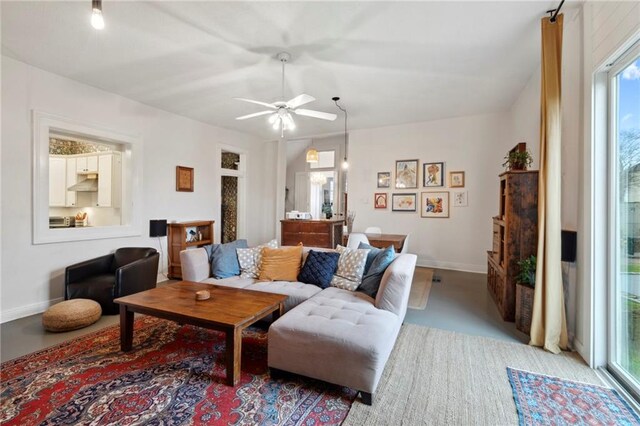 living room with ceiling fan