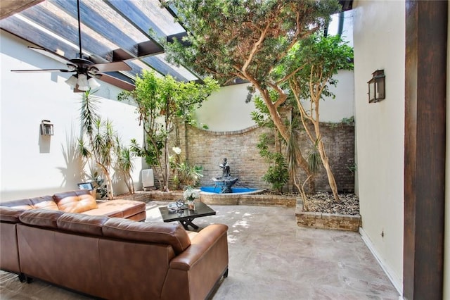 view of patio / terrace featuring ceiling fan