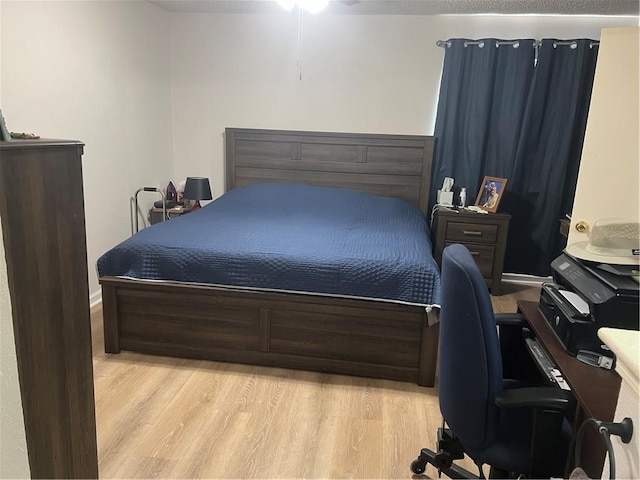 149 Avant Garde Cir Unit 149, Kenner, LA 70065 - bedroom with light wood finished floors and an office area