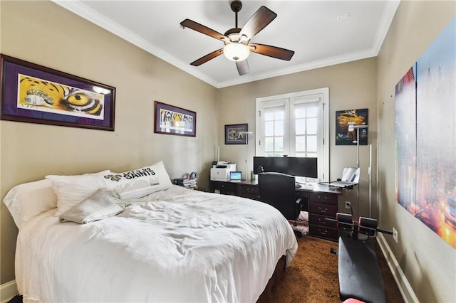 carpeted bedroom featuring ceiling fan and crown molding