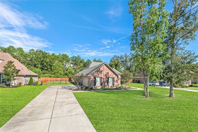 single story home with a front yard