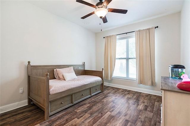 bedroom featuring ceiling fan and dark wood-type flooring