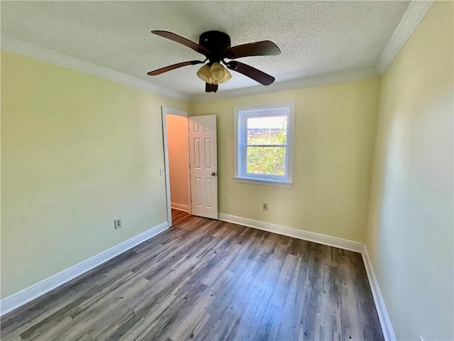 unfurnished bedroom with ornamental molding, wood-type flooring, ceiling fan, and a textured ceiling