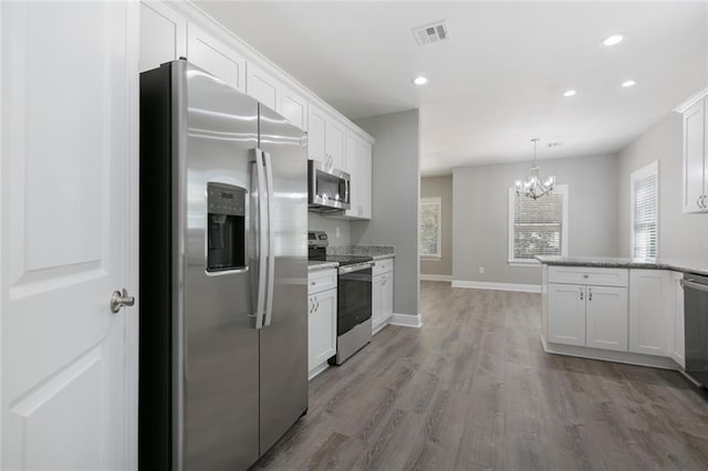 kitchen featuring white cabinets and stainless steel appliances