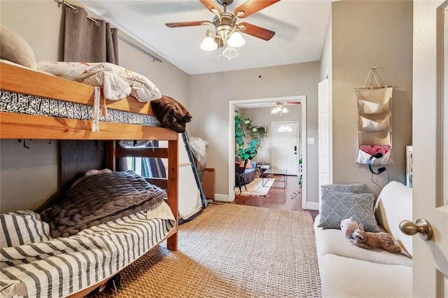 531-33 S Murat St, New Orleans, LA 70119 - bedroom with baseboards, wood finished floors, and a ceiling fan