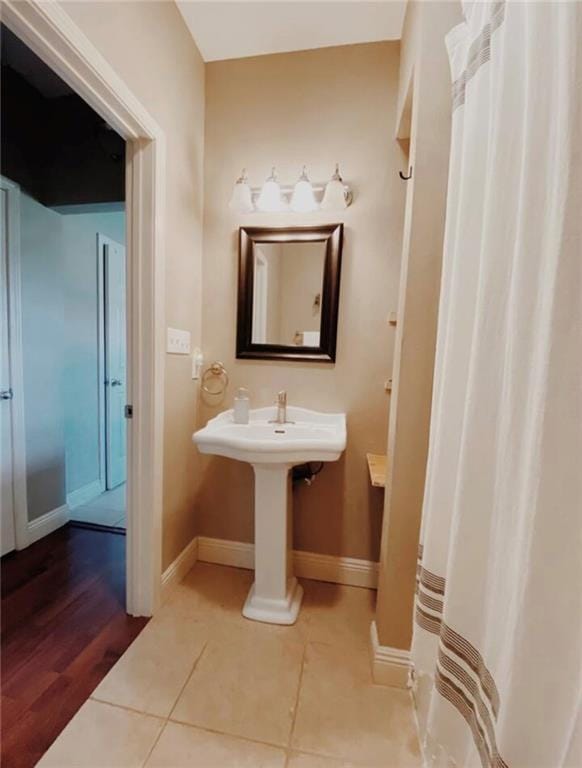 bathroom with tile patterned flooring