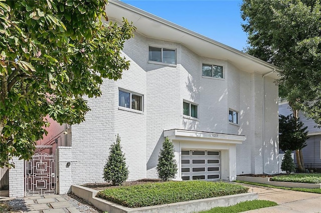 view of property exterior with a garage