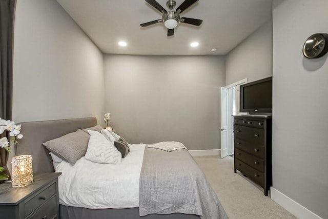 carpeted bedroom featuring ceiling fan