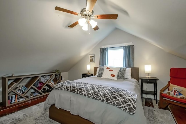 bedroom with carpet, ceiling fan, and lofted ceiling