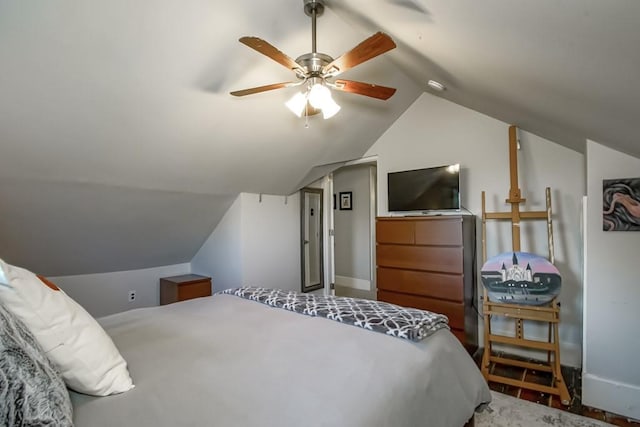 bedroom with ceiling fan and lofted ceiling