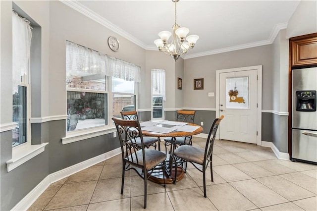 tiled dining room with crown molding and an inviting chandelier