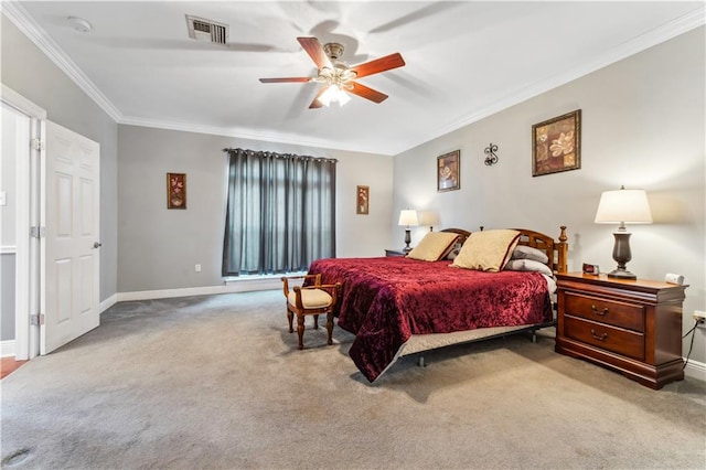 bedroom featuring crown molding, carpet flooring, and ceiling fan