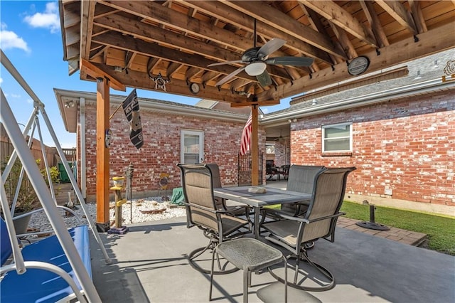 view of patio / terrace featuring ceiling fan