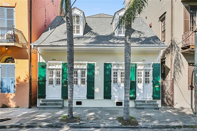 doorway to property with a balcony