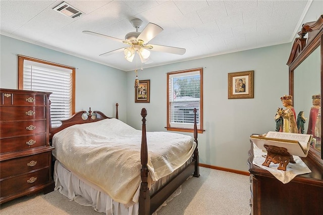 bedroom with light carpet and ceiling fan