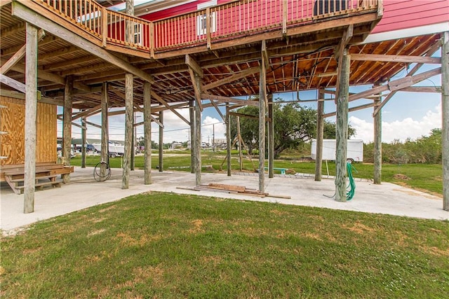 view of yard featuring a deck and a patio area