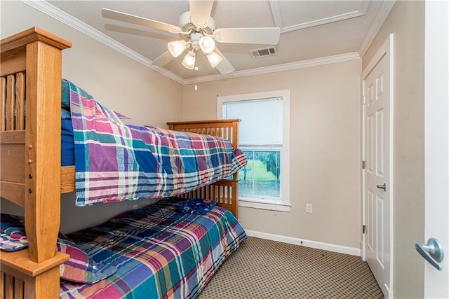 carpeted bedroom with ceiling fan and crown molding