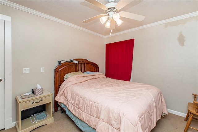 bedroom with ceiling fan, a textured ceiling, crown molding, and carpet