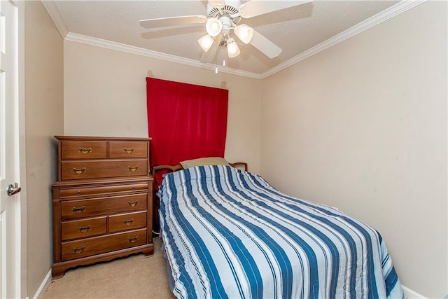 bedroom featuring light carpet, ceiling fan, and crown molding