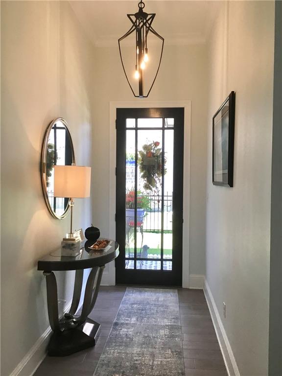 foyer with dark hardwood / wood-style flooring