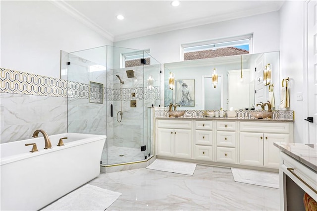 bathroom with shower with separate bathtub, vanity, and ornamental molding