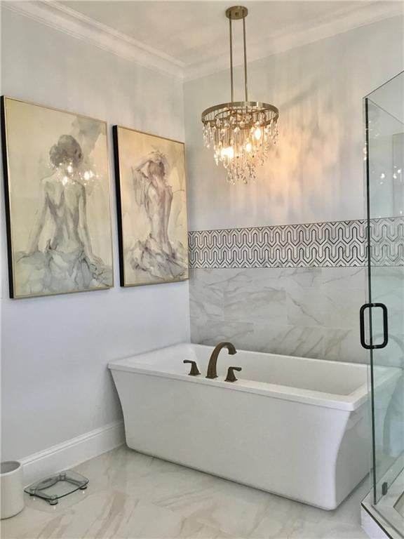 bathroom featuring independent shower and bath, a chandelier, and ornamental molding