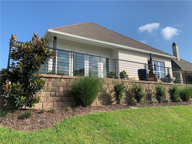106 Grand Champions Ln, Slidell, LA 70458 - view of home's exterior with stucco siding