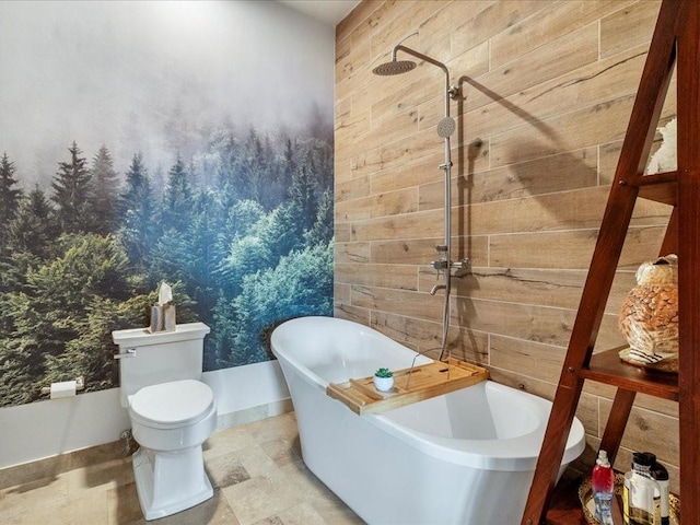 bathroom with wooden walls, toilet, and plus walk in shower