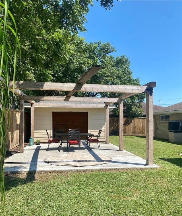 view of community with a pergola, a lawn, and a patio area