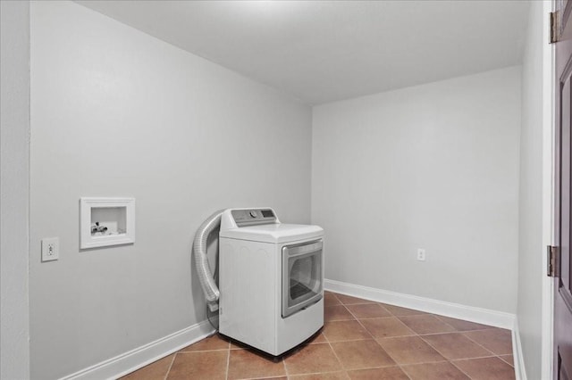 2016 Pelitere Cv, Chalmette, LA 70043 - laundry room with washer / clothes dryer, laundry area, baseboards, and tile patterned floors