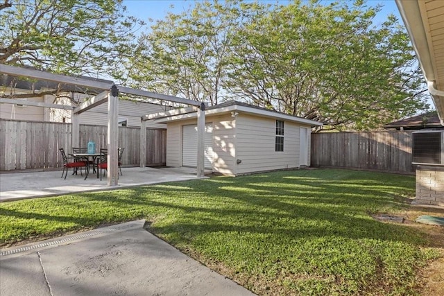 2016 Pelitere Cv, Chalmette, LA 70043 - view of yard featuring a patio, an outbuilding, and a fenced backyard