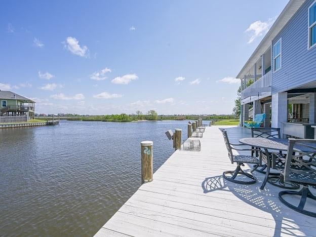 view of dock with a water view